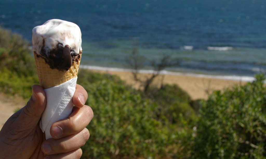 Overlooking the beach at Black Rock, eating dark chocolate sorbet with cherry yoghurt gelato.