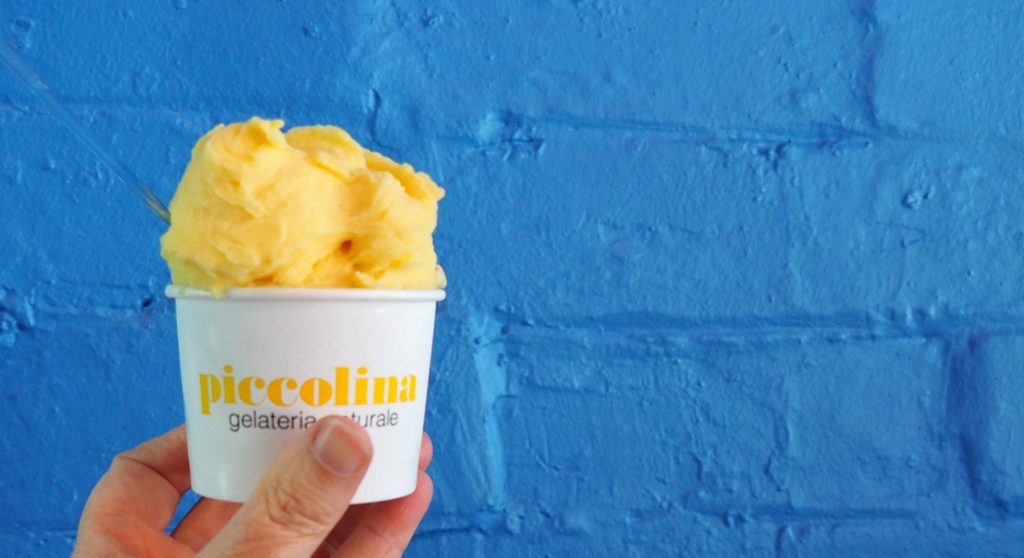 Mango sorbetto from Piccolina. Salted caramel gelato is underneath