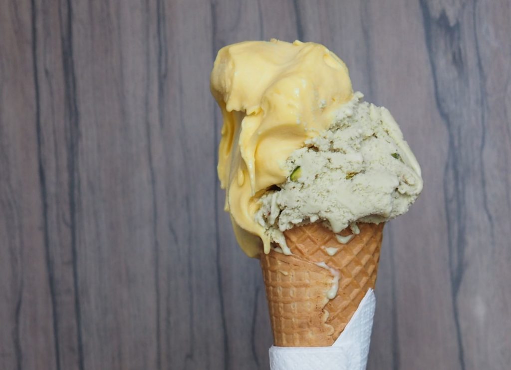A classic pistachio gelato paired with freshly churned mango from Gelobar