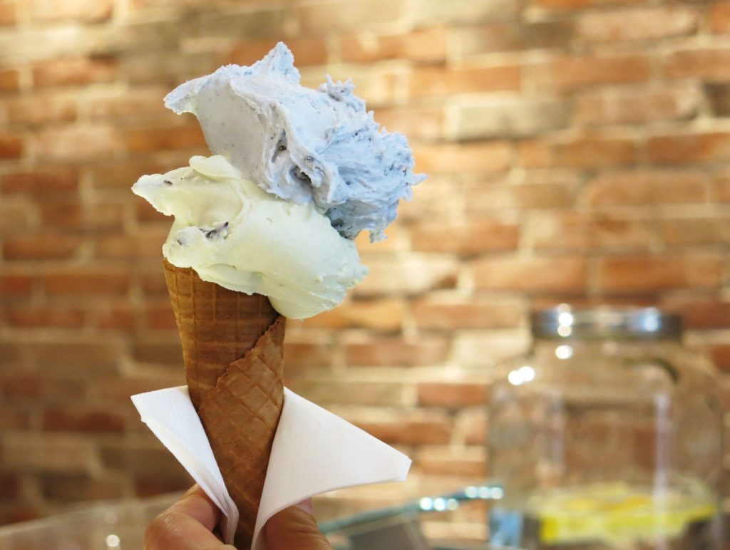 The delicate pale blue of Milk and Cookies gelato is from blue pea. Paired here with Mint Strachiatella.