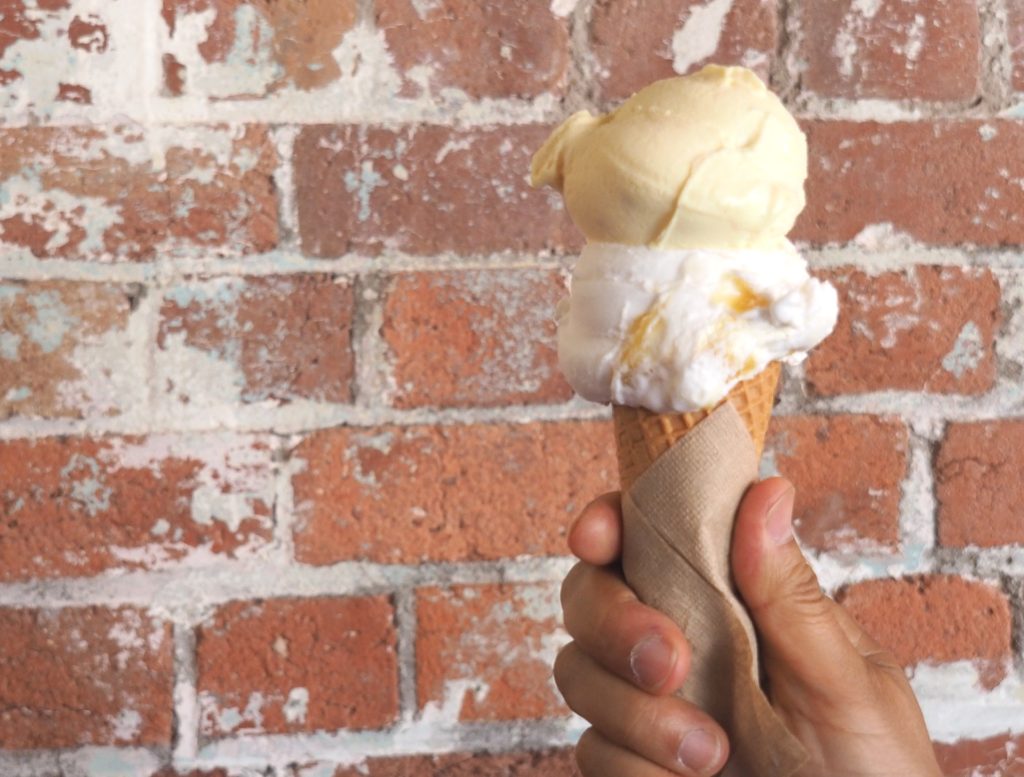 Messina's most popular sorbetto - salted coconut with mango - with passionfruit sorbetto.