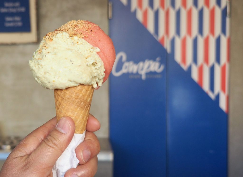 A classic pistachio gelato paired with citrus infused strawberry sorbetto at Gelato Compa. The fresh fruit for the sorbetto came from the Yarra Valley.